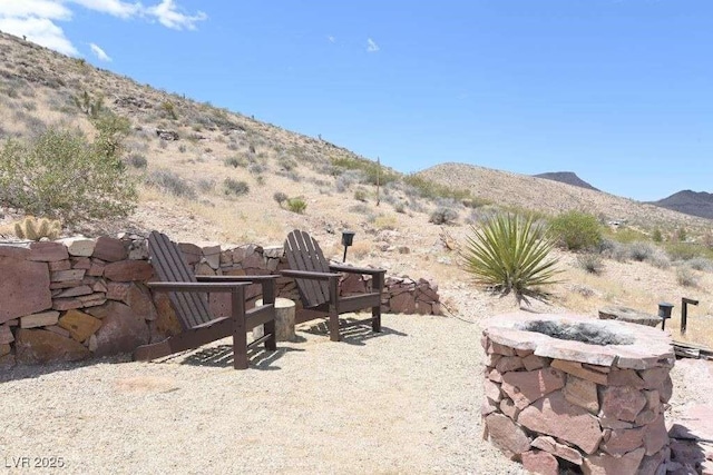 275 Vegas Dr, Goodsprings, NV 89019 - view of patio / terrace with a fire pit and a mountain view