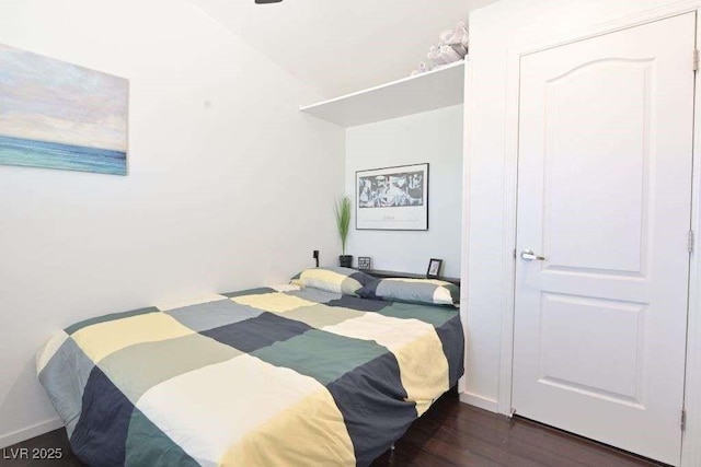 275 Vegas Dr, Goodsprings, NV 89019 - bedroom featuring dark wood-style flooring and baseboards