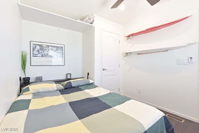 275 Vegas Dr, Goodsprings, NV 89019 - bedroom featuring wood finished floors, baseboards, and a ceiling fan