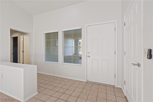9105 Marble Dr, Las Vegas, NV 89134 - entrance foyer with light tile patterned flooring and baseboards