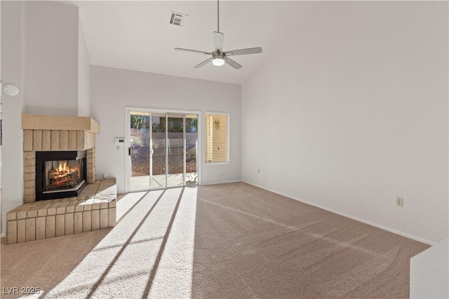 9105 Marble Dr, Las Vegas, NV 89134 - unfurnished living room featuring carpet floors, a ceiling fan, a brick fireplace, baseboards, and high vaulted ceiling
