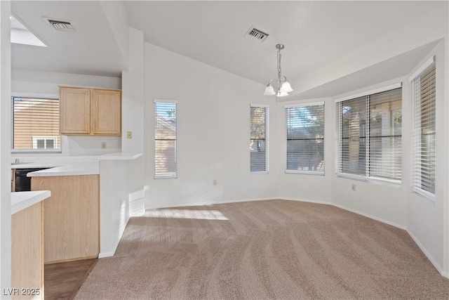 9105 Marble Dr, Las Vegas, NV 89134 - unfurnished dining area featuring a chandelier, light colored carpet, baseboards, and vaulted ceiling
