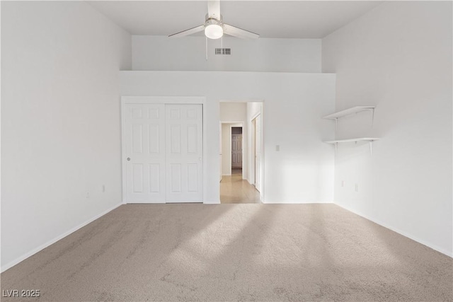 9105 Marble Dr, Las Vegas, NV 89134 - unfurnished bedroom with carpet flooring, baseboards, a closet, and ceiling fan