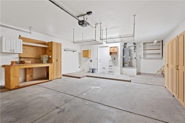 9105 Marble Dr, Las Vegas, NV 89134 - garage with a garage door opener and water heater