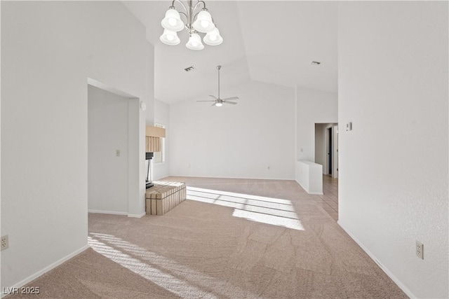 9105 Marble Dr, Las Vegas, NV 89134 - unfurnished living room with high vaulted ceiling, carpet, a chandelier, a ceiling fan, and baseboards