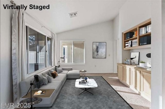 9105 Marble Dr, Las Vegas, NV 89134 - living area featuring lofted ceiling, carpet, and baseboards