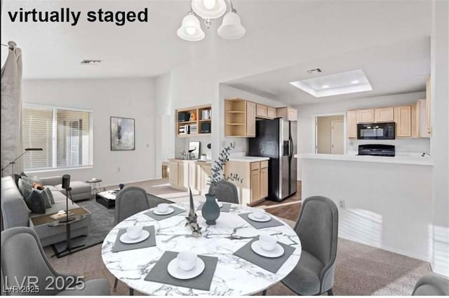 9105 Marble Dr, Las Vegas, NV 89134 - dining area with a tray ceiling and lofted ceiling