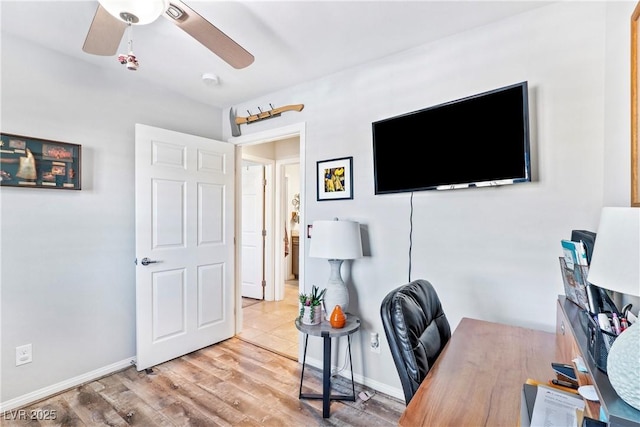 2225 Chandler Ranch Pl, Laughlin, NV 89029 - office with ceiling fan, wood finished floors, and baseboards