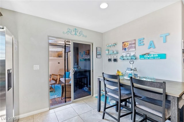 2225 Chandler Ranch Pl, Laughlin, NV 89029 - dining room with tile patterned flooring and baseboards