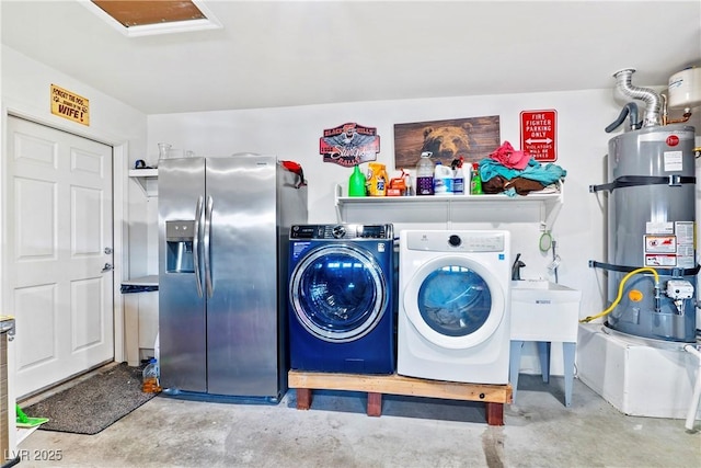 2225 Chandler Ranch Pl, Laughlin, NV 89029 - laundry room with strapped water heater and independent washer and dryer