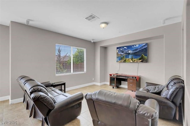 9840 Chief Sky St, Las Vegas, NV 89178 - living area with light tile patterned flooring and baseboards