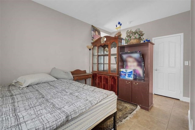9840 Chief Sky St, Las Vegas, NV 89178 - bedroom with light tile patterned flooring
