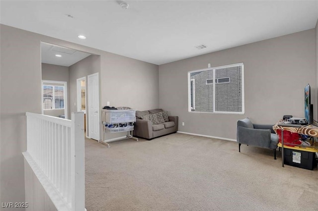 9840 Chief Sky St, Las Vegas, NV 89178 - sitting room featuring carpet floors, baseboards, an upstairs landing, and recessed lighting