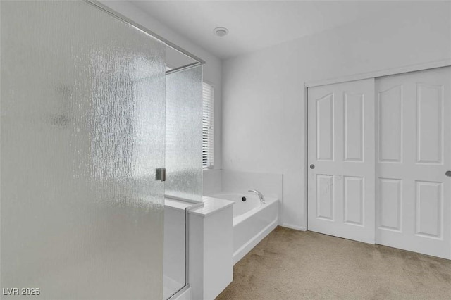 9840 Chief Sky St, Las Vegas, NV 89178 - bathroom featuring a stall shower and a garden tub