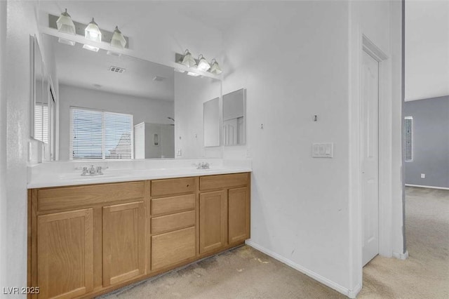 9840 Chief Sky St, Las Vegas, NV 89178 - full bath featuring double vanity and baseboards