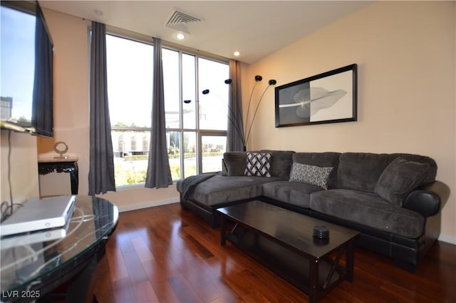 4585 Dean Martin Dr Unit 205, Las Vegas, NV 89103 - living room with wood finished floors and baseboards