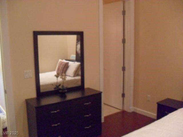 4585 Dean Martin Dr Unit 205, Las Vegas, NV 89103 - bedroom featuring baseboards