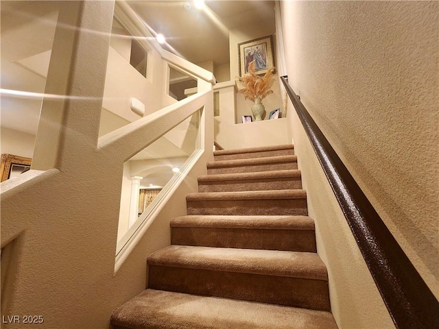 6729 Flamenco Ct, Las Vegas, NV 89139 - stairs with a textured wall