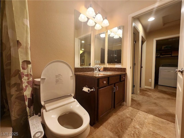 6729 Flamenco Ct, Las Vegas, NV 89139 - full bathroom featuring washer / dryer and vanity