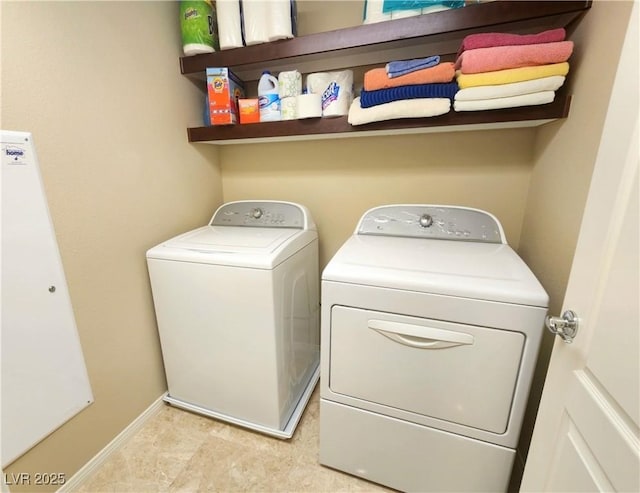 6729 Flamenco Ct, Las Vegas, NV 89139 - laundry area with washing machine and clothes dryer and baseboards
