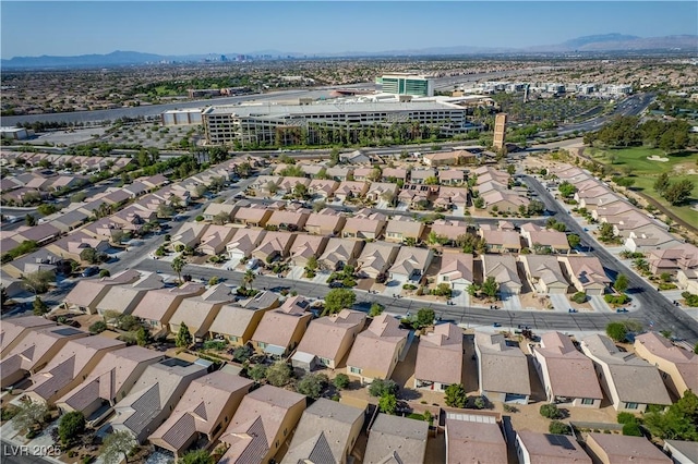 2708 Cheer Pheasant Ave, North Las Vegas, NV 89084 - aerial overview of property's location featuring a mountainous background and nearby suburban area