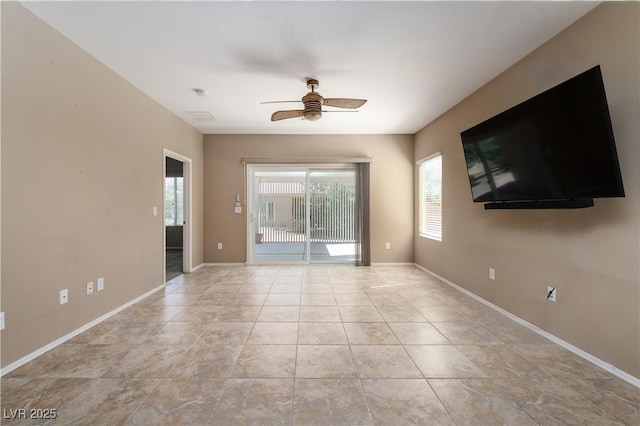 2708 Cheer Pheasant Ave, North Las Vegas, NV 89084 - empty room featuring ceiling fan, baseboards, and light tile patterned floors