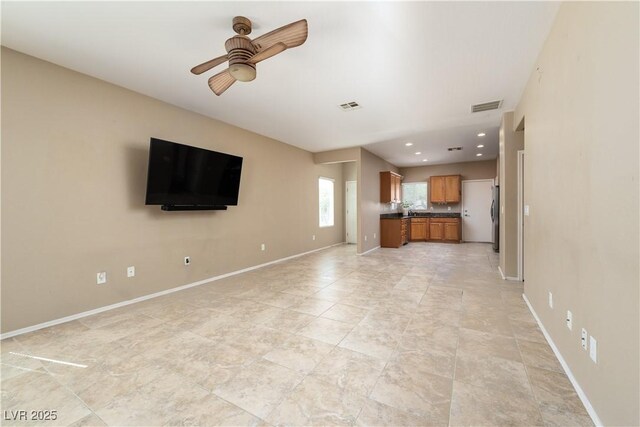 2708 Cheer Pheasant Ave, North Las Vegas, NV 89084 - unfurnished living room with ceiling fan and recessed lighting