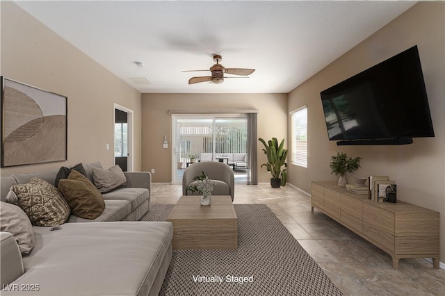 2708 Cheer Pheasant Ave, North Las Vegas, NV 89084 - living area featuring ceiling fan and baseboards