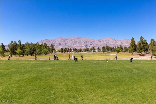 2708 Cheer Pheasant Ave, North Las Vegas, NV 89084 - view of property's community featuring a mountain view and a lawn