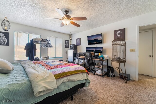 1575 W Warm Springs Rd Unit 2822, Henderson, NV 89014 - bedroom featuring carpet floors, a textured ceiling, a ceiling fan, and a desk