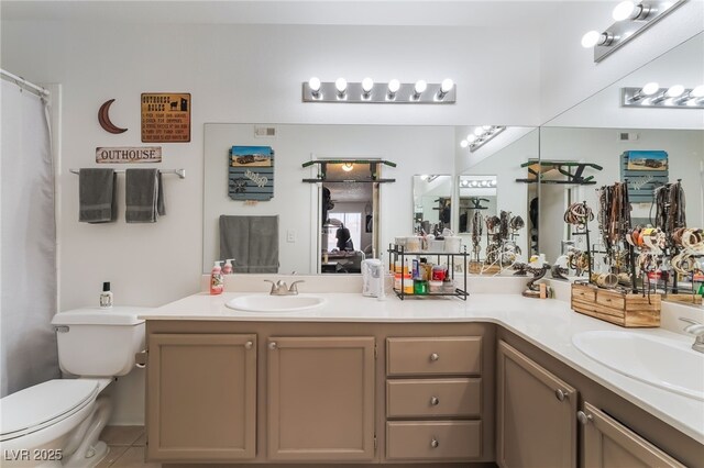 1575 W Warm Springs Rd Unit 2822, Henderson, NV 89014 - bathroom featuring double vanity, toilet, and tile patterned floors