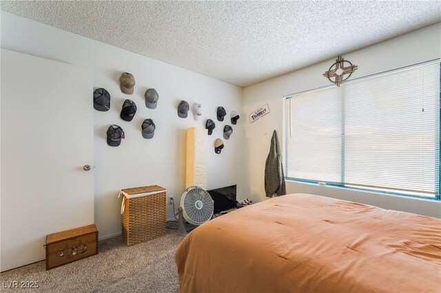 1575 W Warm Springs Rd Unit 2822, Henderson, NV 89014 - carpeted bedroom featuring a textured ceiling