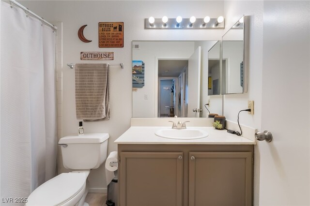 1575 W Warm Springs Rd Unit 2822, Henderson, NV 89014 - bathroom with toilet, vanity, and curtained shower