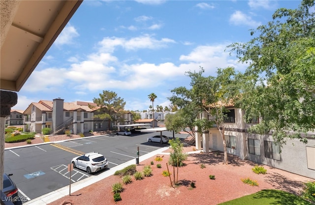 1575 W Warm Springs Rd Unit 2822, Henderson, NV 89014 - uncovered parking lot featuring a residential view