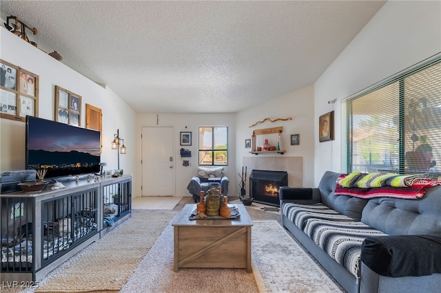 1575 W Warm Springs Rd Unit 2822, Henderson, NV 89014 - carpeted living room with a textured ceiling and a fireplace