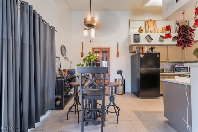 1575 W Warm Springs Rd Unit 2822, Henderson, NV 89014 - dining area with light tile patterned floors and ceiling fan