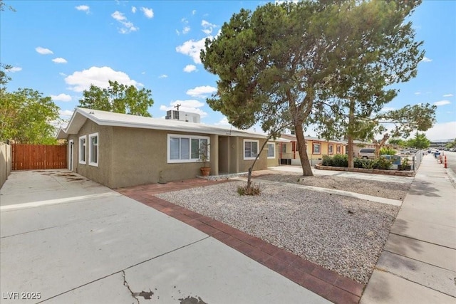 2408 Berkley Ave, Las Vegas, NV 89101 - ranch-style house with stucco siding and a patio area
