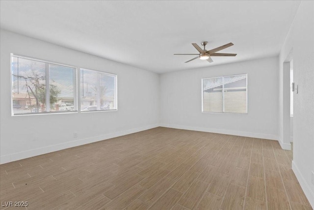 2408 Berkley Ave, Las Vegas, NV 89101 - empty room featuring light wood finished floors, a ceiling fan, and baseboards