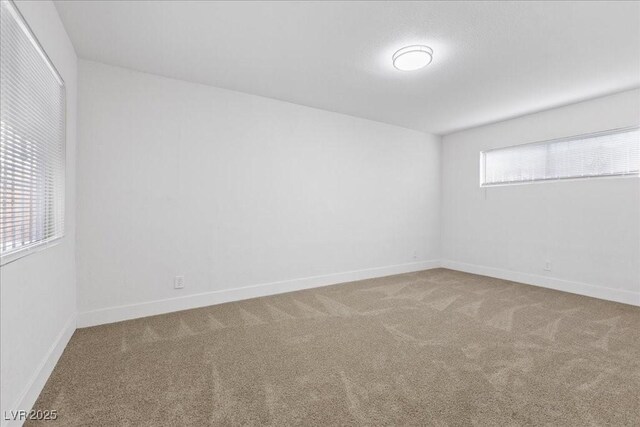 2408 Berkley Ave, Las Vegas, NV 89101 - empty room with carpet and baseboards