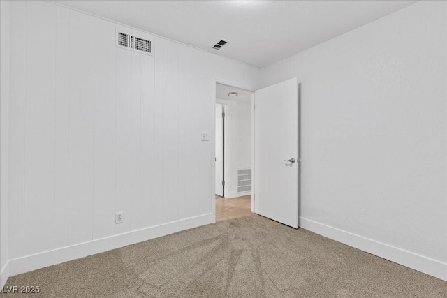 2408 Berkley Ave, Las Vegas, NV 89101 - spare room featuring carpet flooring and baseboards