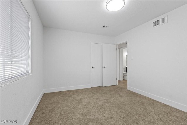 2408 Berkley Ave, Las Vegas, NV 89101 - unfurnished bedroom featuring carpet floors and baseboards