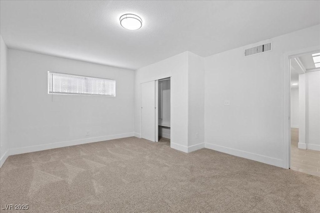 2408 Berkley Ave, Las Vegas, NV 89101 - unfurnished bedroom with carpet, a closet, and baseboards