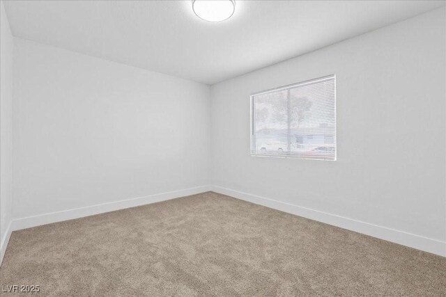 2408 Berkley Ave, Las Vegas, NV 89101 - unfurnished room with carpet flooring and baseboards