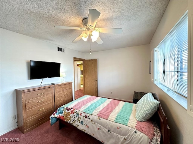 4151 Sanderling Cir Unit 351, Las Vegas, NV 89103 - bedroom featuring a textured ceiling, carpet flooring, and ceiling fan