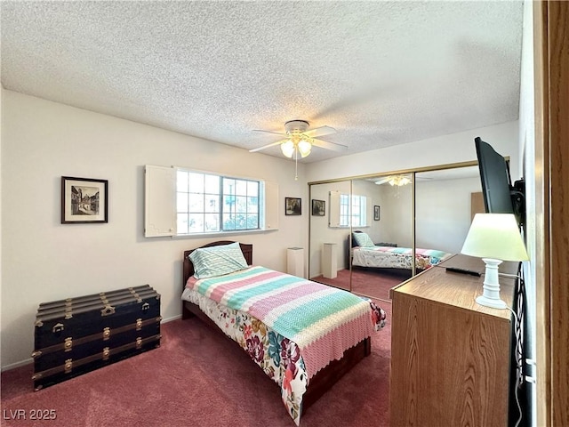 4151 Sanderling Cir Unit 351, Las Vegas, NV 89103 - carpeted bedroom with a textured ceiling, a closet, and ceiling fan