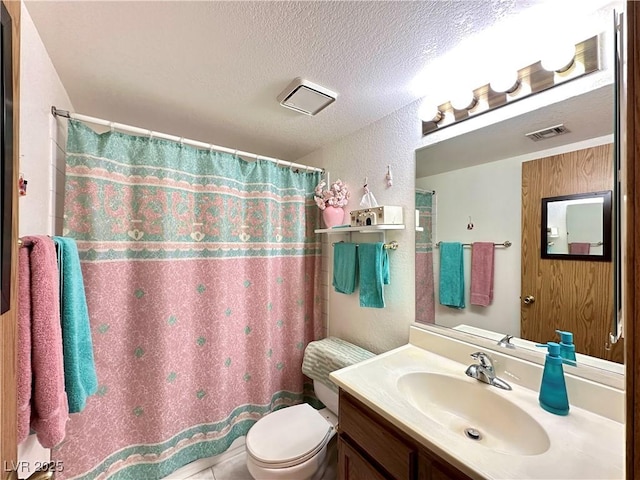 4151 Sanderling Cir Unit 351, Las Vegas, NV 89103 - full bathroom featuring toilet, vanity, a textured ceiling, a shower with curtain, and a textured wall