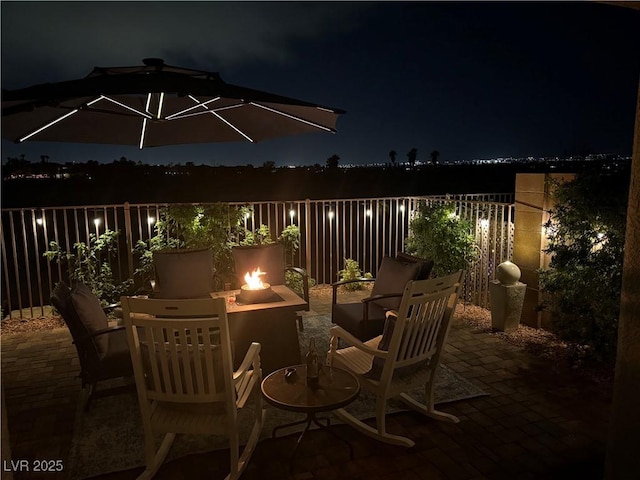 7029 Bocaire Dr, Las Vegas, NV 89131 - patio at twilight with a fire pit and a patio area