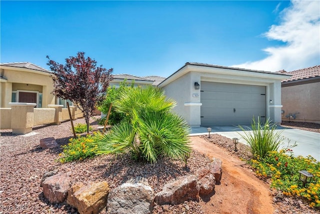 7029 Bocaire Dr, Las Vegas, NV 89131 - view of front of property with driveway, a garage, and stucco siding