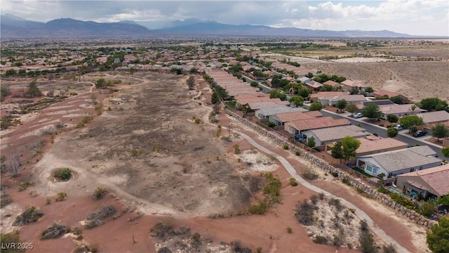 7029 Bocaire Dr, Las Vegas, NV 89131 - aerial view of residential area with a mountainous background and a desert landscape