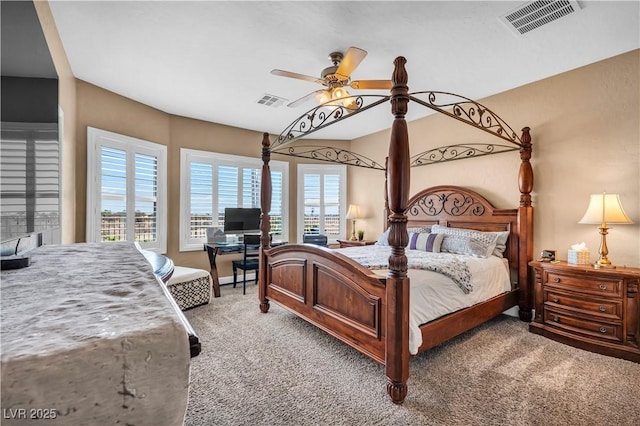 7029 Bocaire Dr, Las Vegas, NV 89131 - bedroom featuring light colored carpet, a desk, and a ceiling fan